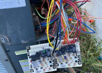 Picture of exposed wires on the outside portion of an HVAC Unit